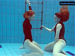 two torrid teenagers underwater
