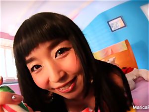 asian starlet Marica Hase plays with candy manmeat