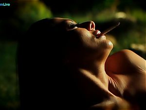 super-steamy Sandra Romain smokes a ciggie and masturbates